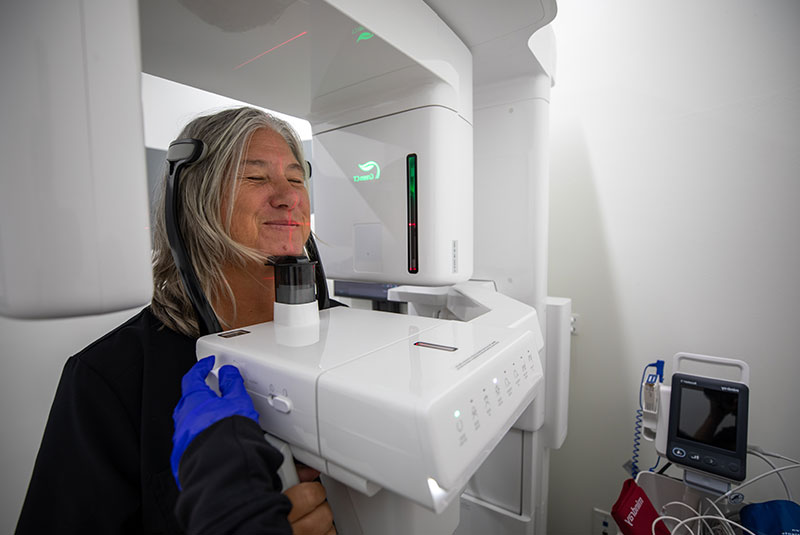 Patient having a digital dental x-ray taken